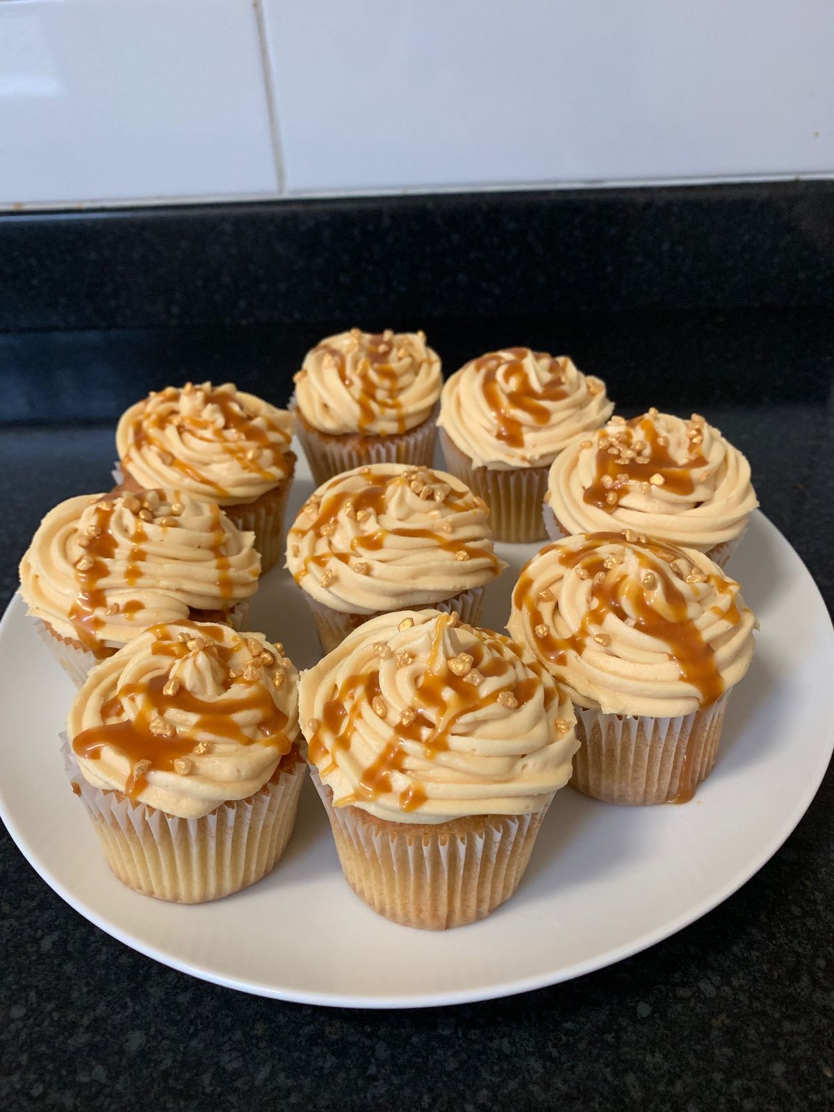 Freshly baked salted caramel cupcake with sweet caramel flavor and a delicate hint of salt.